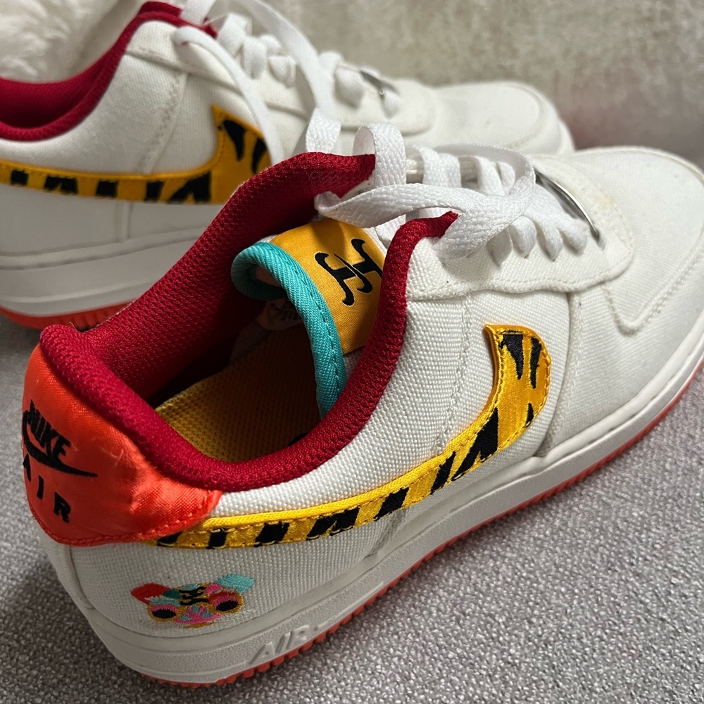 Nike Air Force ones women’s size 7 cream and tiger print 🐅